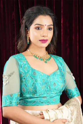 Cyan Pure ikkat Raw silk blouse with Rhinestone detailing in back and sleeves