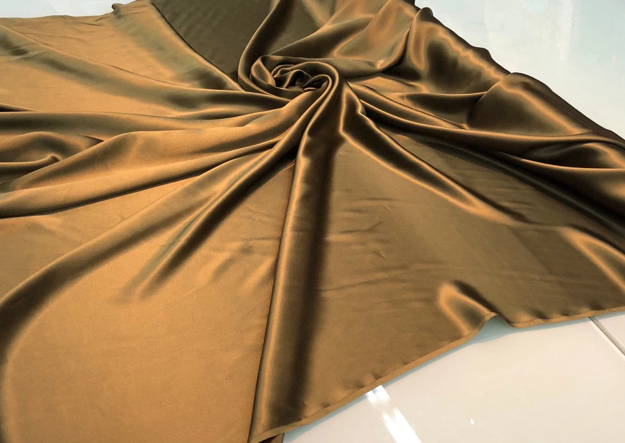Silk charmouse 54&quot; wide    Beautiful bronze color silk charmouse fabric sold by the yard